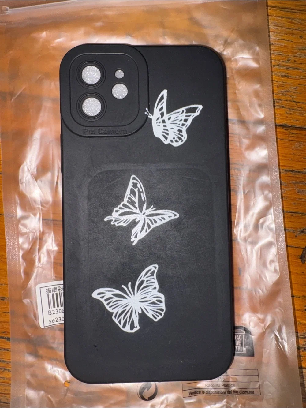 Apple Black Silicone Phone Case with White Butterfly Accents